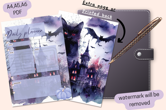 Halloween daily planner with a purple castle and black cat design, featuring bats and a bonus divider page.